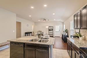 a kitchen with a sink and a counter top at Serene 3BR Retreat near East Austin in Austin