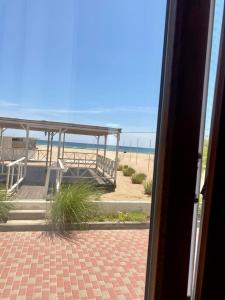 a view of the beach from a room at ALION HOTEL Бугаз Перша Лінія in Zatoka