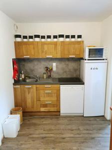Kuchyň nebo kuchyňský kout v ubytování Appartement Termignon Val Cenis