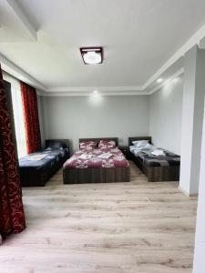 Postel nebo postele na pokoji v ubytování New Batumi