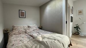 a bedroom with a large bed in a room at bedandbreakfastrouveen in Rouveen