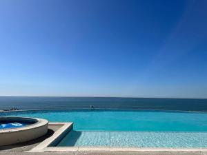 Bazén v ubytování Calafia, Oceanview Condo Resort in Rosarito. nebo v jeho okolí