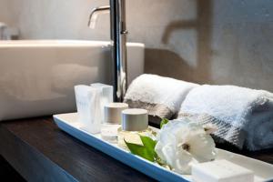 Postel nebo postele na pokoji v ubytování Ramo d'Aria Etna Boutique Hotel