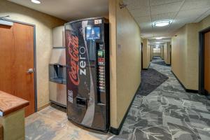 a large soda vending machine in a hallway at Creekside Lodge at Custer State Park Resort in Custer