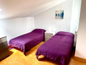 Uma cama ou camas num quarto em Duplex CARDELLY