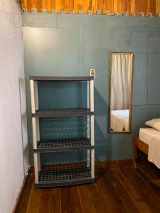 Postel nebo postele na pokoji v ubytování Mauras Tropical Mini Hostel & Tours