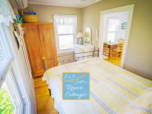 Postel nebo postele na pokoji v ubytování Waterfront Cottage 6