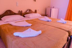 Postel nebo postele na pokoji v ubytování Anatoli Beach Hotel