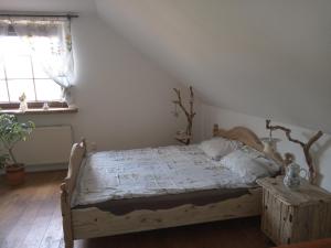 Ένα ή περισσότερα κρεβάτια σε δωμάτιο στο Chatka skrzatka +45 φωτογραφίες