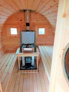 a room in a wooden cabin with a stove in it at Soma City - House - Vacation STAY 14664 