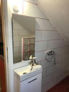 Ванна кімната в Versay Apartment