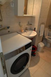 Koupelna v ubytování Dobi Apartmani WING