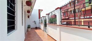 an empty corridor of a building with a balcony at Casa Céntrica en Palenque in Palenque