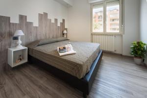 Krevet ili kreveti u jedinici u objektu Appartamenti Le Perle di Venere