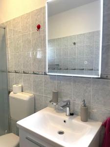 Kúpeľňa v ubytovaní Apartments Molo Mare