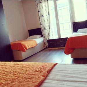Кровать или кровати в номере Elit Yurt&Aile Pansyonu