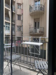 a view of a building from a window at Casa Velasquez in Palermo
