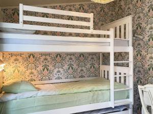 Postel nebo postele na pokoji v ubytování Holiday home KLÄSSBOL II