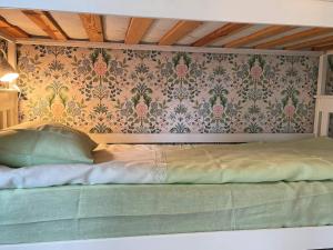 Postel nebo postele na pokoji v ubytování Holiday home KLÄSSBOL II