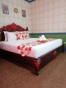 Letto o letti in una camera di Sang Yoo Mountain View Tagaytay Bed and Breakfast - Taal Lake View