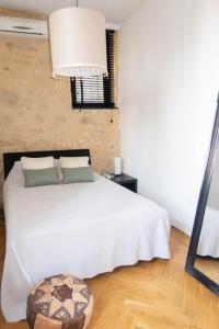 Säng eller sängar i ett rum på Villa pont du Gard 4 Bedrooms