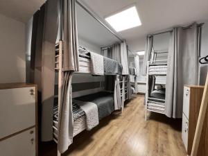 a dorm room with bunk beds in it at Хостел Житомир GREEN HOUSE in Zhytomyr