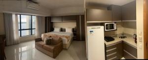 Kuchyň nebo kuchyňský kout v ubytování Tropical Executive Hotel