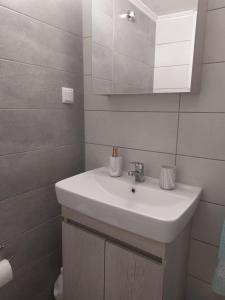 Kúpeľňa v ubytovaní Luminosa Seaview Apartment + 20 fotografií
