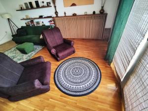 Posezení v ubytování Hedonists Paradise