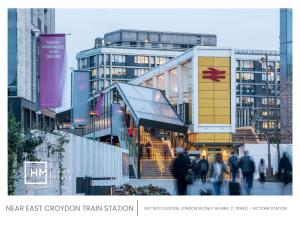 a train station with people walking in a city at Erin Court Mansions - Suite 10 in Croydon +4 photos