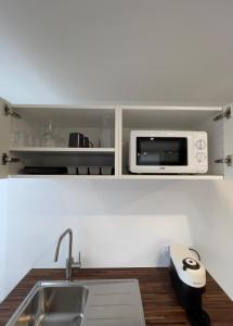 Kuchyň nebo kuchyňský kout v ubytování L'Etape, logement climatisé !