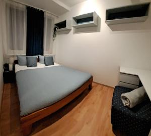 Postel nebo postele na pokoji v ubytování Apartament Roma