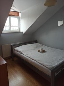Postel nebo postele na pokoji v ubytování Lawendowe Love Rynek Rzeszow close center