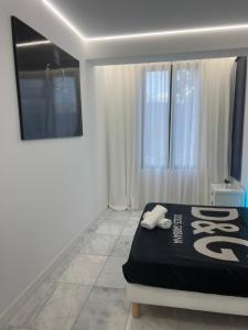 Postel nebo postele na pokoji v ubytování DeLuxe House Valencia
