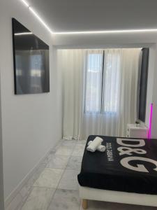 Postel nebo postele na pokoji v ubytování DeLuxe House Valencia