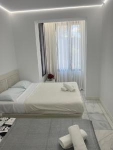 Postel nebo postele na pokoji v ubytování DeLuxe House Valencia