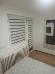 Letto o letti in una camera di stan na dan IM