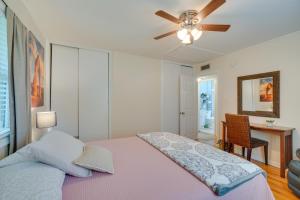 a bedroom with a bed and a ceiling fan at Oak Ridge Retreat with Porch Less Than 1 Mi to Downtown in Oak Ridge +21 photos