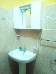 Een badkamer bij Appartamento Ortensia