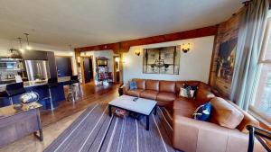 a living room with a couch and a table at The Salt Flat - Salt Lake City in Salt Lake City +22 photos