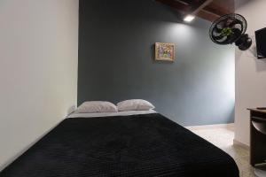 Postel nebo postele na pokoji v ubytování Living Hotel