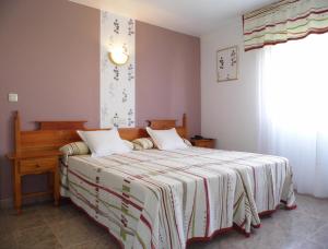 Postel nebo postele na pokoji v ubytování Hotel Arboleda