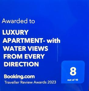 a blue screen with the text awarded to luxury apartment with water views from every direction at LUXURY APARTMENT- with WATER VIEWS FROM EVERY DIRECTION in Gold Coast