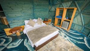 Postel nebo postele na pokoji v ubytování Glamping Magic Love