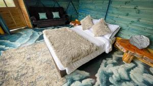 Postel nebo postele na pokoji v ubytování Glamping Magic Love