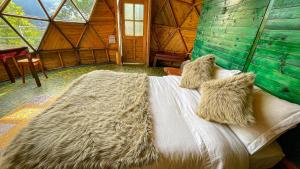 Postel nebo postele na pokoji v ubytování Glamping Magic Love