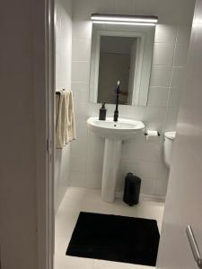 Koupelna v ubytování Niko Rooms