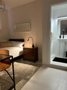 Postel nebo postele na pokoji v ubytování Niko Rooms