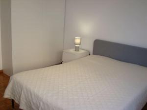 Llit o llits en una habitació de 1Bed Tagus River View