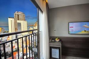 TV a/nebo společenská místnost v ubytování Ivy Hotel Nha Trang